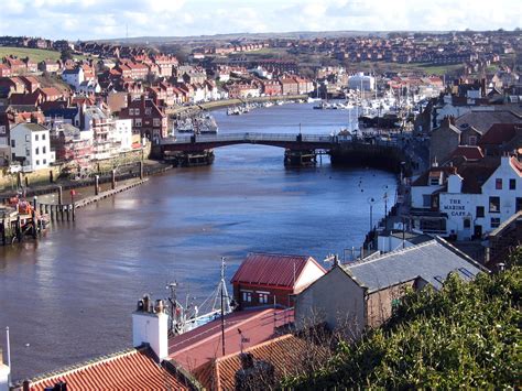 Whitby on the Yorkshire coast, a stunning sight with atmospheric Abbey ruins looking out to sea ...