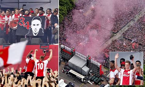 Ajax stars welcomed by more than 100,000 fans in Amsterdam as they ...