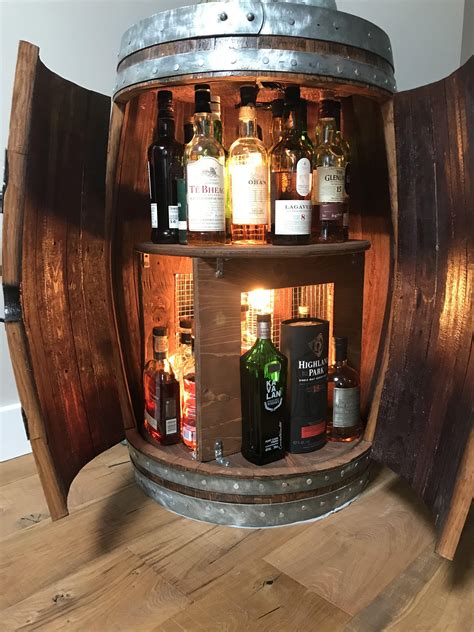 I made a whisky cabinet out of an old wine barrel : r/whiskey