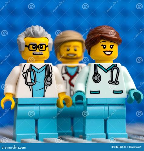 Three Lego Doctor Minifigures Standing Against a Blue Baseplate ...