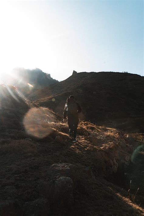 A Person Hiking a Mountain · Free Stock Photo