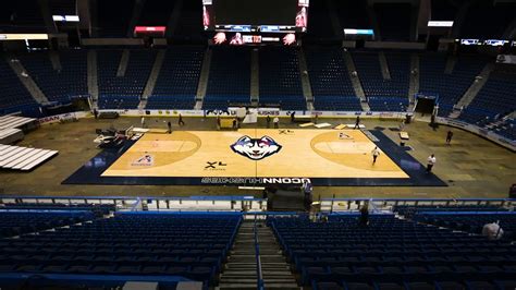 XL Center: Basketball to hockey stadium transformation - YouTube