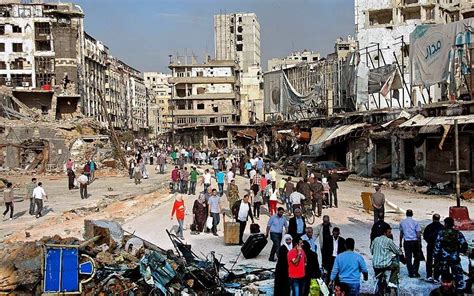 Hundreds of Syrians return to Homs to find a city of death - Telegraph