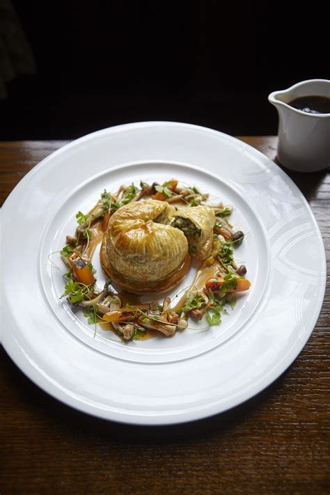 A delightful #vegetarian main course: Celeriac and Swiss chard pithivier, wild mushroom, onio ...