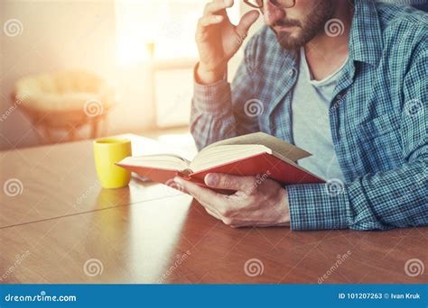 Man Reading Book with Cup of Tea or Coffee Stock Image - Image of knowledge, book: 101207263