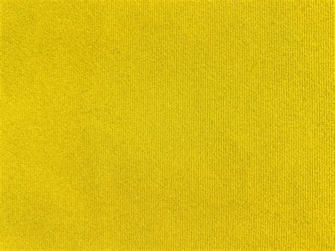 Yellow velvet fabric texture used as background. Empty yellow fabric background of soft and ...