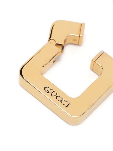 Gucci engraved-logo Chunky Hoop Earring - Farfetch