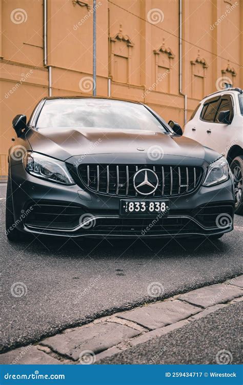 Vertical Shot of a Matte Black Mercedes-AMG C-class Coupe. Editorial ...