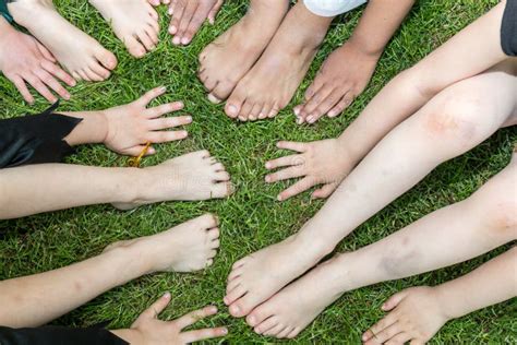 Kids feet pickup up blocks stock image. Image of body - 21165765