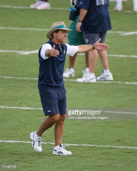 Coach Nick Saban of the Miami Dolphins conducts practice during the...