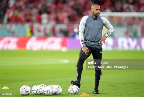 Belgium assistant coach Thierry Henry watches warm up prior to the ...