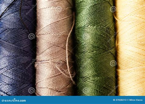 Spools of thread stock image. Image of spools, grass - 37028213