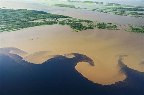 Solimões River, Brazil/Peru. Solimões river at the confluence or the ...