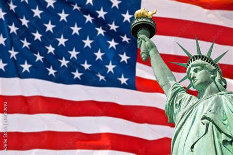 Statue of Liberty, United Stated flag background, New York, USA Stock ...