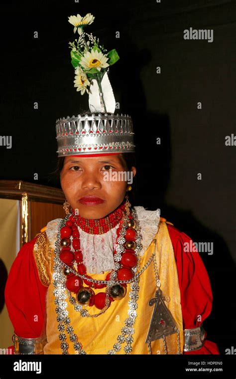 Tribal Girl in traditional Khasi dress called Jainsem,giving the body a cylindrical shape. She ...