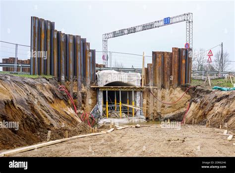 construction of a pedestrian tunnel under the highway, temporary metal ...