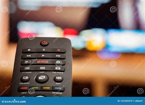 TV Remote with Dedicated Netflix Button in Front of Defocused Smart TV Editorial Stock Image ...