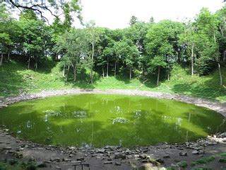 Kaali meteorite crater | Looking down into the bright green … | Flickr