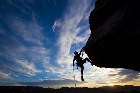 Silhouette of man climbing on mountain during daytime HD wallpaper | Wallpaper Flare