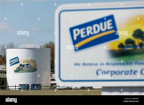 A logo sign outside of the headquarters of Perdue Farms in Salisbury ...