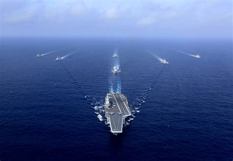 Chinese Aircraft Carrier Sails into Pacific as State Media Mock U.S. Navy's Coronavirus Troubles