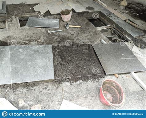 Installation of Granite Tiles on the Floor. Stock Photo - Image of floor, construction: 267220132