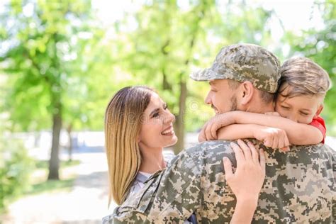 Male Soldier with His Family Outdoors. Military Service Stock Photo - Image of camouflage ...