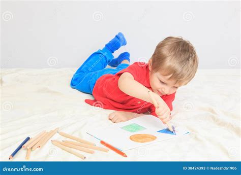 Child drawing shapes stock image. Image of home, crayons - 38424393