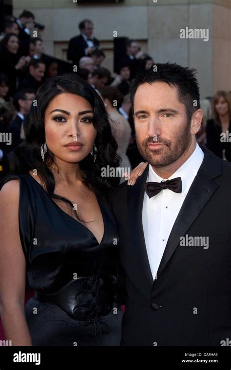 US musician Trent Reznor and his wife Mariqueen Maandig arrive for the 83rd Academy Awards, the ...