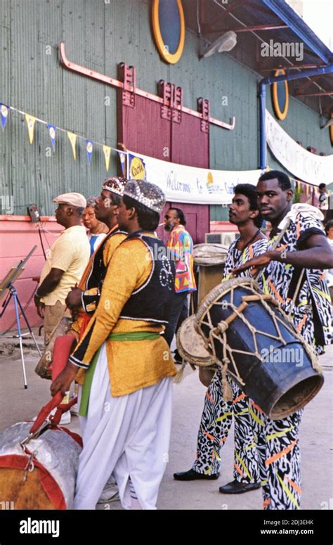 1980s Trinidad and Tobago - East and West Indian musicians entertain ...