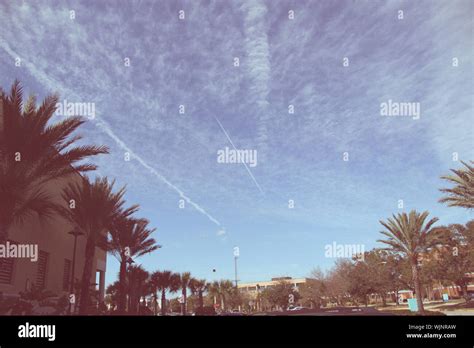 Airplane Vapor Trail In Sky Stock Photo - Alamy