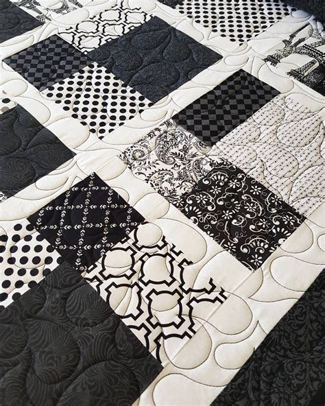 Beautiful black and white quilt by Teresa L! Quilted with the pattern "Watercourse" #quilting # ...