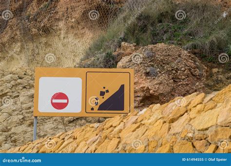 Landslide warning sign stock image. Image of hazardous - 61494555