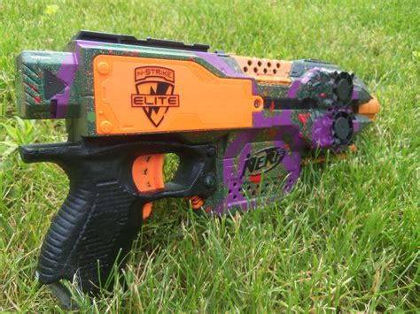 Who keeps posting all these Stryfe paintjobs? : Nerf