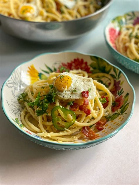 Bacon Perciatelli with Garlic and Quail Eggs - Adriana's Best Recipes