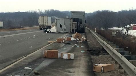 UPS Truck Crash Spills Packages Along Highway | wnep.com