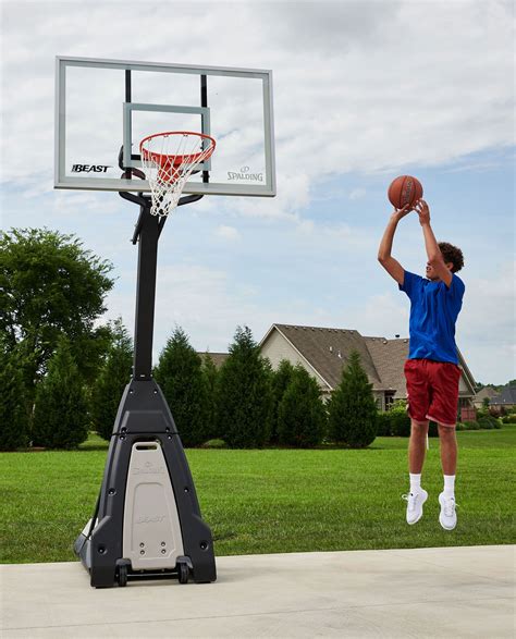 Spalding The Beast Glass Portable Basketball Hoop System l Spalding.com