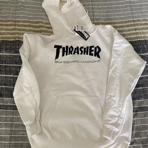 Brand new white thrasher hoodie with that’s size medium - Depop