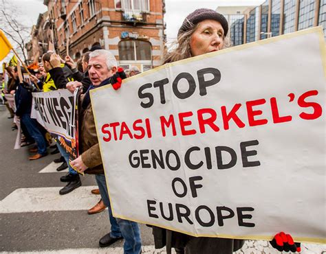 Protest on the sidelines of Angela Merkel's official visit in Brussels ...