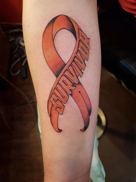 Chris Sanders of Nightshade Ink, Cincinnati OH did this fantastic Leukemia survivor ribbon on me ...