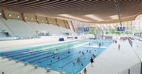 undulating timber aquatics center wins competition for 2024 paris olympics