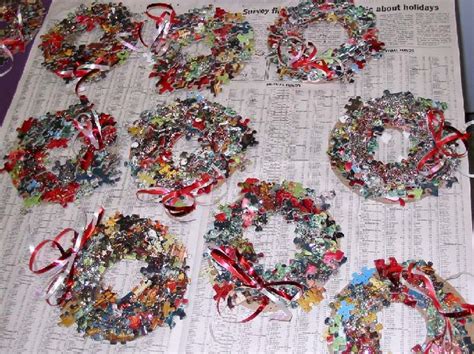 Learn how to make a wreath using old puzzle pieces, glue and glitter. | Puzzle piece art, Puzzle ...