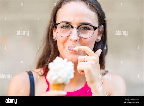 Smiling woman with ice creams hi-res stock photography and images - Alamy