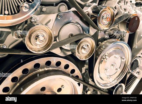 pulley belts car engine background Stock Photo - Alamy