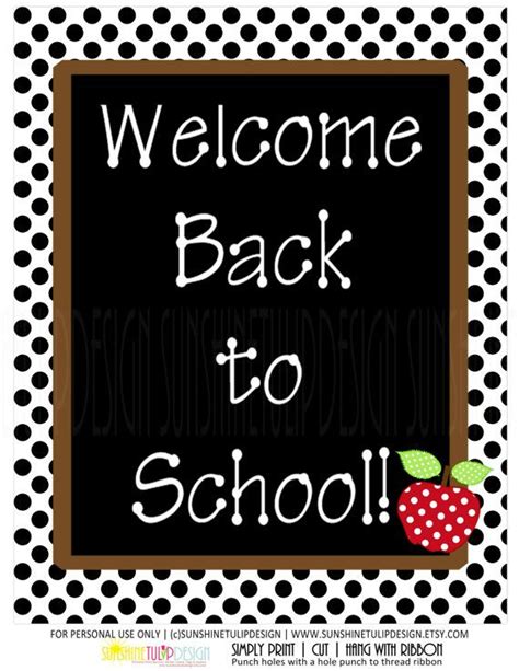 a welcome back to school sign with polka dots and an apple in the center on a black background