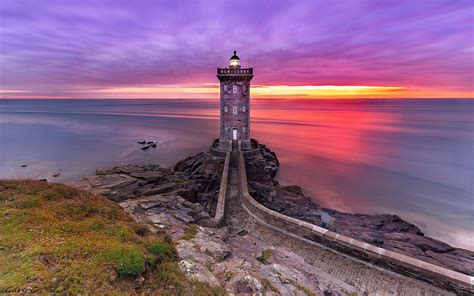 Download Sunset Path To Lighthouse Wallpaper | Wallpapers.com