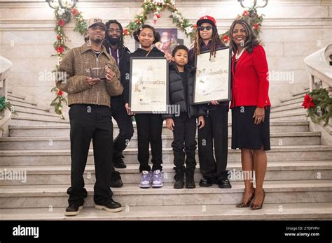 Metro Boomin, left, poses with family members and St. Louis City Mayor ...