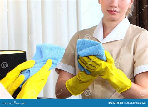 The Maid Wipes the Mirror. Hands in Protective Gloves. Cleaning and Disinfection of the Hotel ...