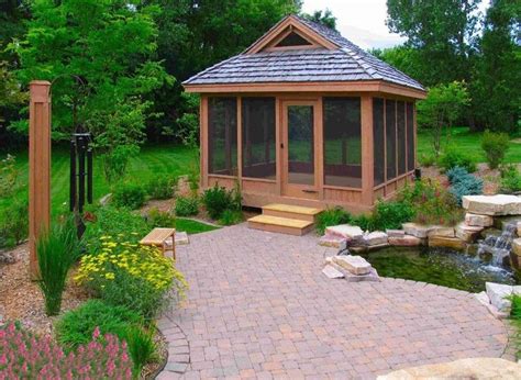 screened in gazebo Garage And Shed Traditional with boulder landscape ...