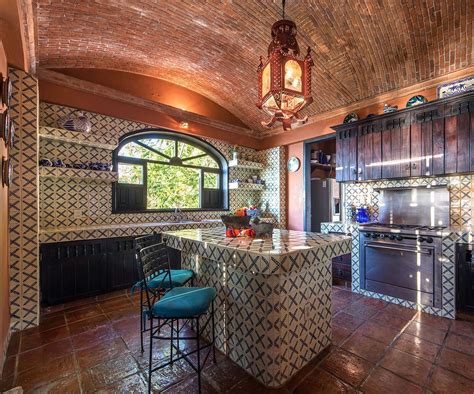 Mexican hacienda style kitchen with barrel ceiling and colourful tiles ...